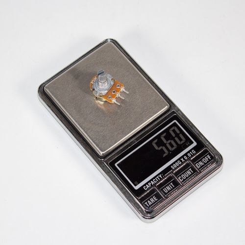 WH148-1-B50K-15 - поворотный потенциометр с шлицевым металлическим валом 15мм_Ø6мм (50КОм, линейный, 1-оборотный, 25х18х25мм, DIP-3)