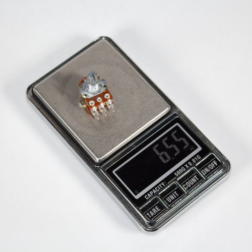 WH148-2-B20K-15 - сдвоенный поворотный потенциометр с шлицевым металлическим валом 15мм_Ø6мм (20КОм, линейный, 1-оборотный, 25х18х25мм, DIP-6)