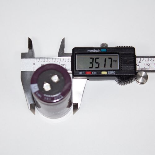 EKMG451VSN122MA60S - электролитический конденсатор алюминиевый, радиальный (1200uF/450V, 105°C, Snap-In, Ø35хL60мм) - производство NIPPON CHEMI-CON