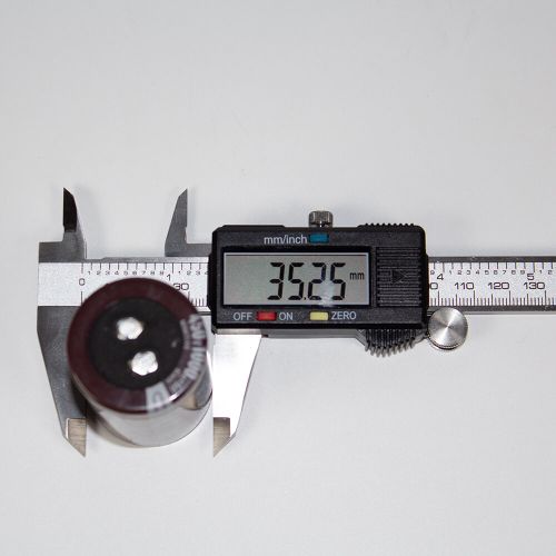 EKMM451VSN102MA60S - электролитический конденсатор алюминиевый, радиальный (1000uF/450V, 105°C, Snap-In, Ø35хL60мм) - производство NIPPON CHEMI-CON