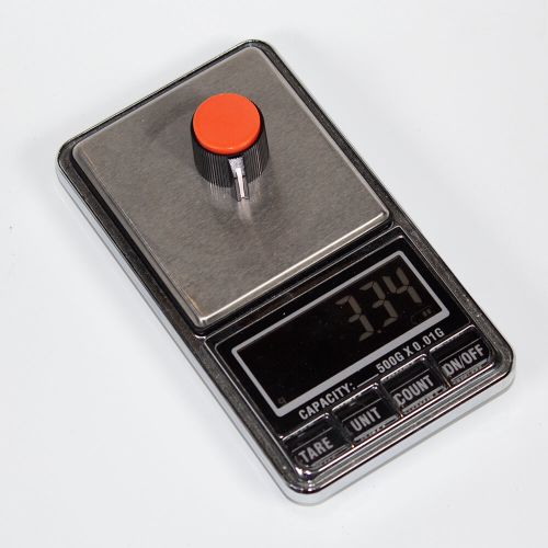 Ручка цилиндрическая для потенциометров, универсальная с оранжевой крышкой (диафрагма Ø6мм, носик указателя с белой насечкой, черный пластик)