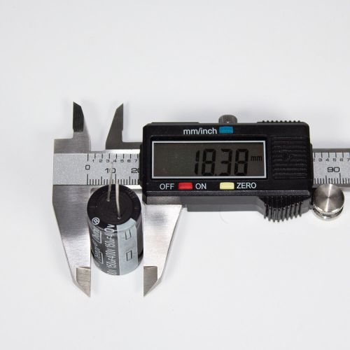 150 мкФ * 400 В - электролитический конденсатор серии KM (150uF/400V, 20%, +105°C, Ø18*36мм) - производство ChengX